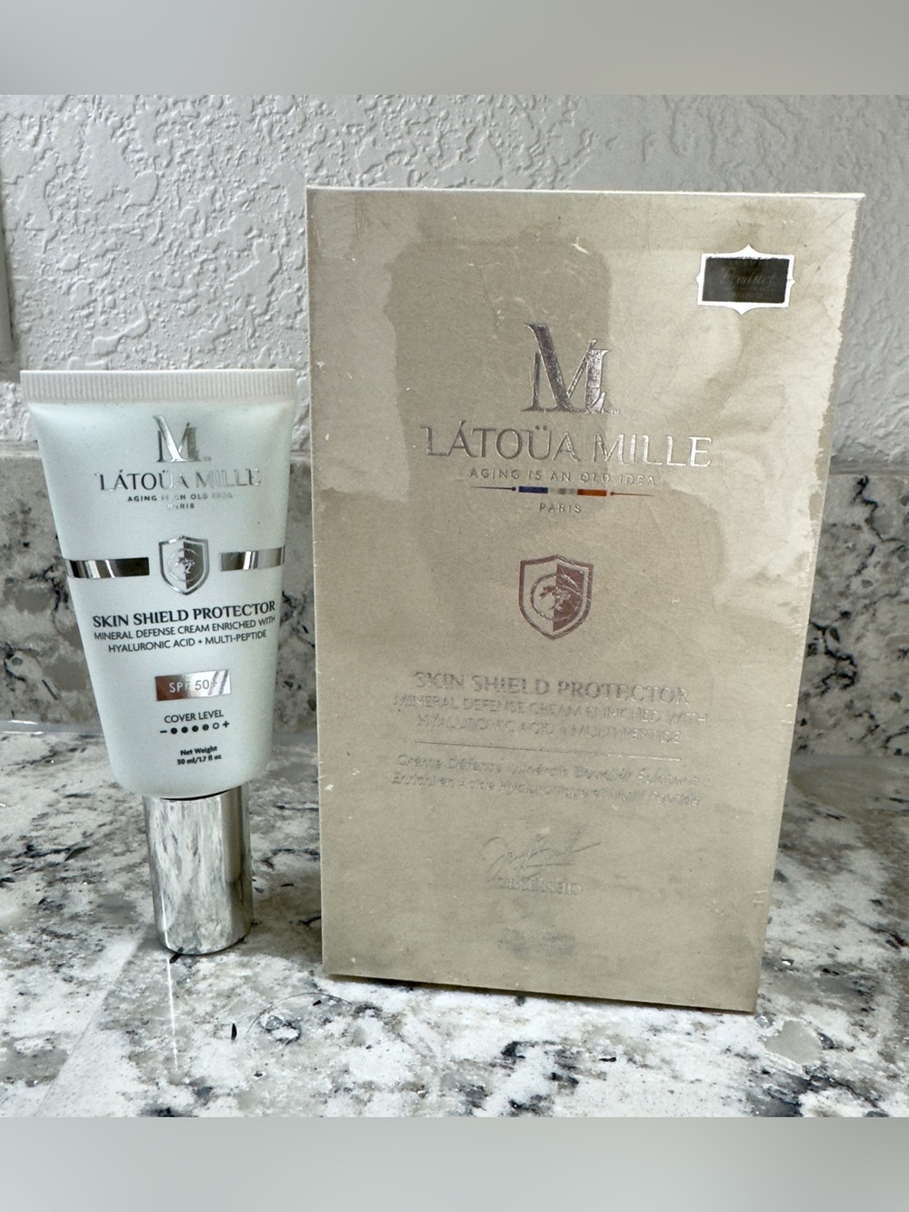 L'ATOUA MILLE Skin Shield Protector SPF 50 - Cream